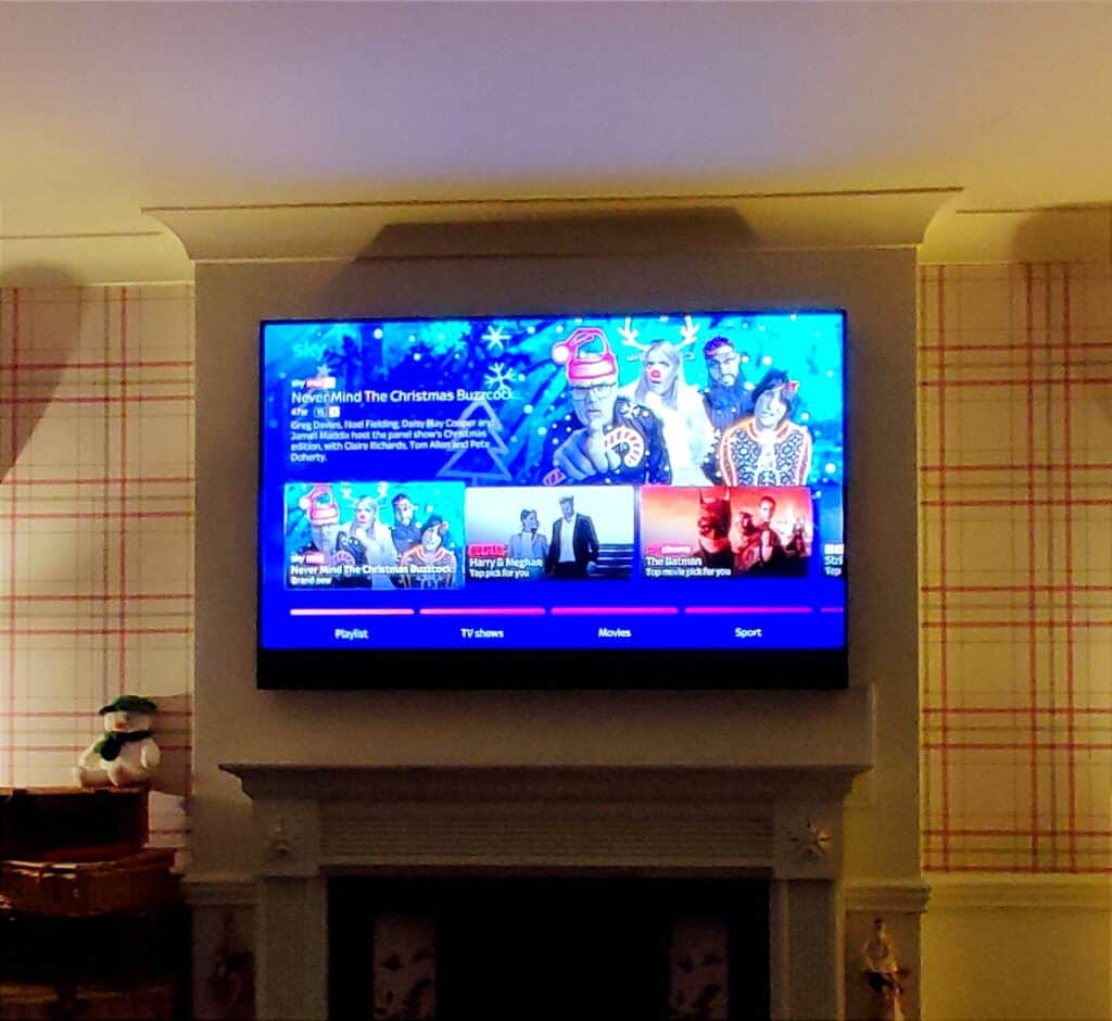 Sky Glass 55" TV Mounted above fireplace