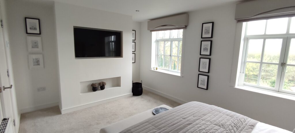White painted room with media wall