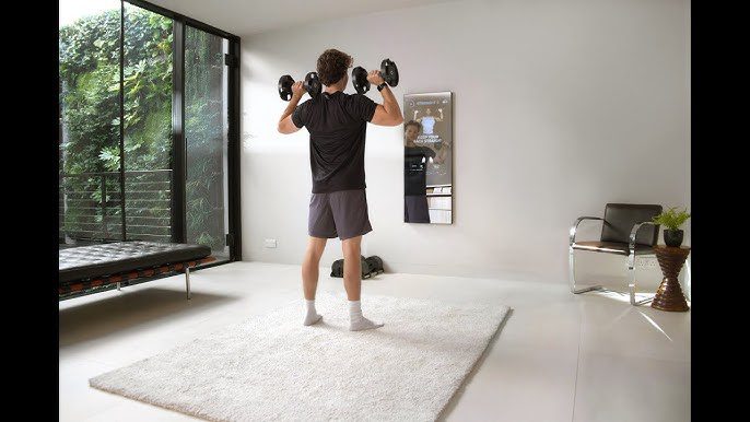man training in front of a magic ai fitness mirror